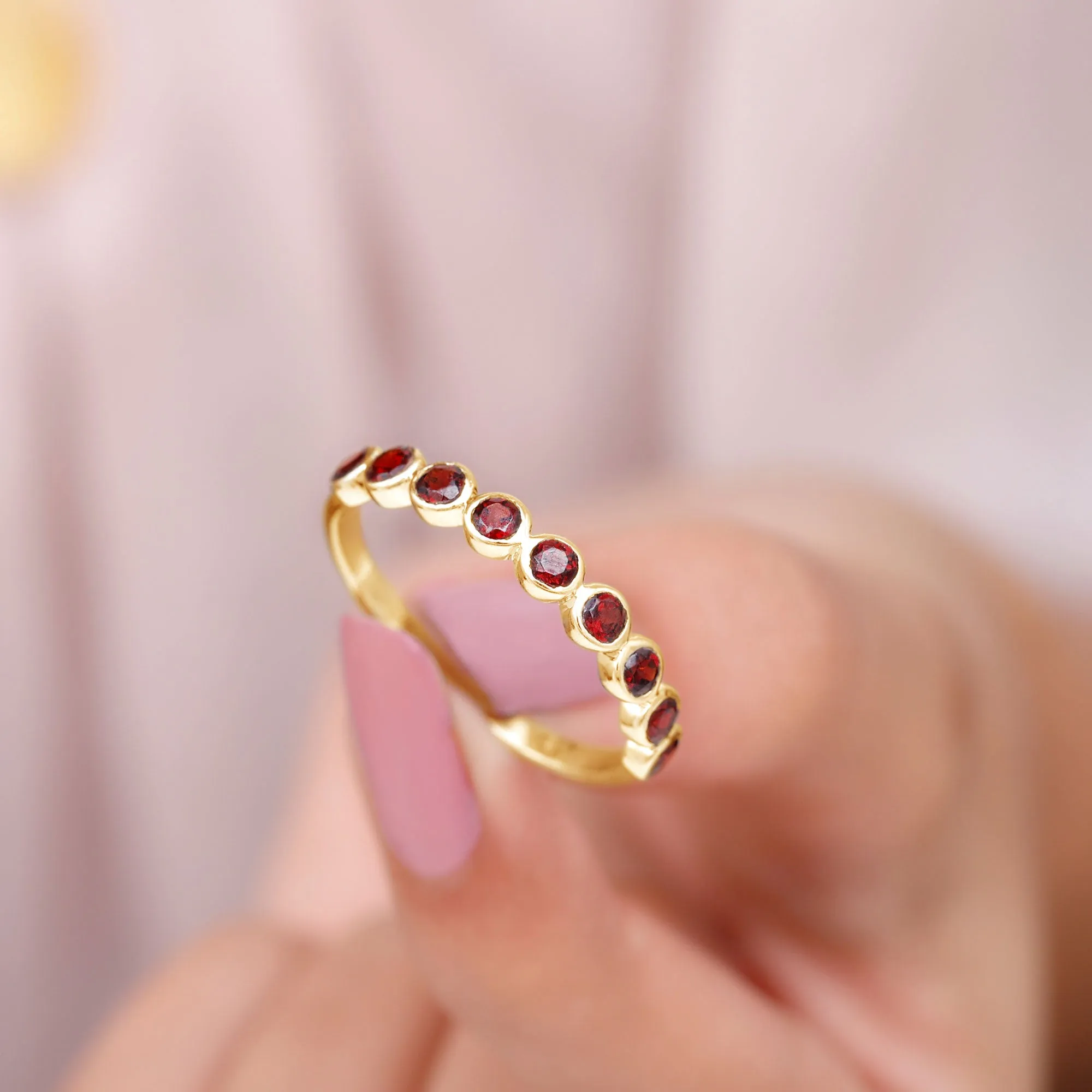 1.25 CT Bezel Set Eternity Band with Garnet