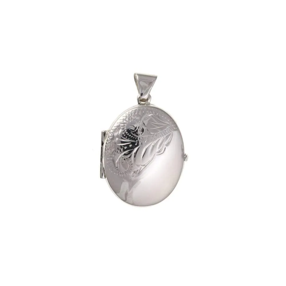 Silver oval half engraved locket includes chain