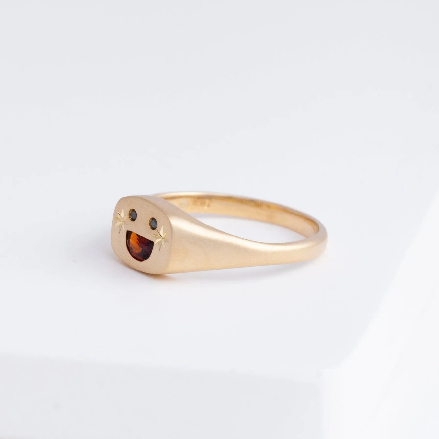 Small happy face signet ring with sparkly cheeks