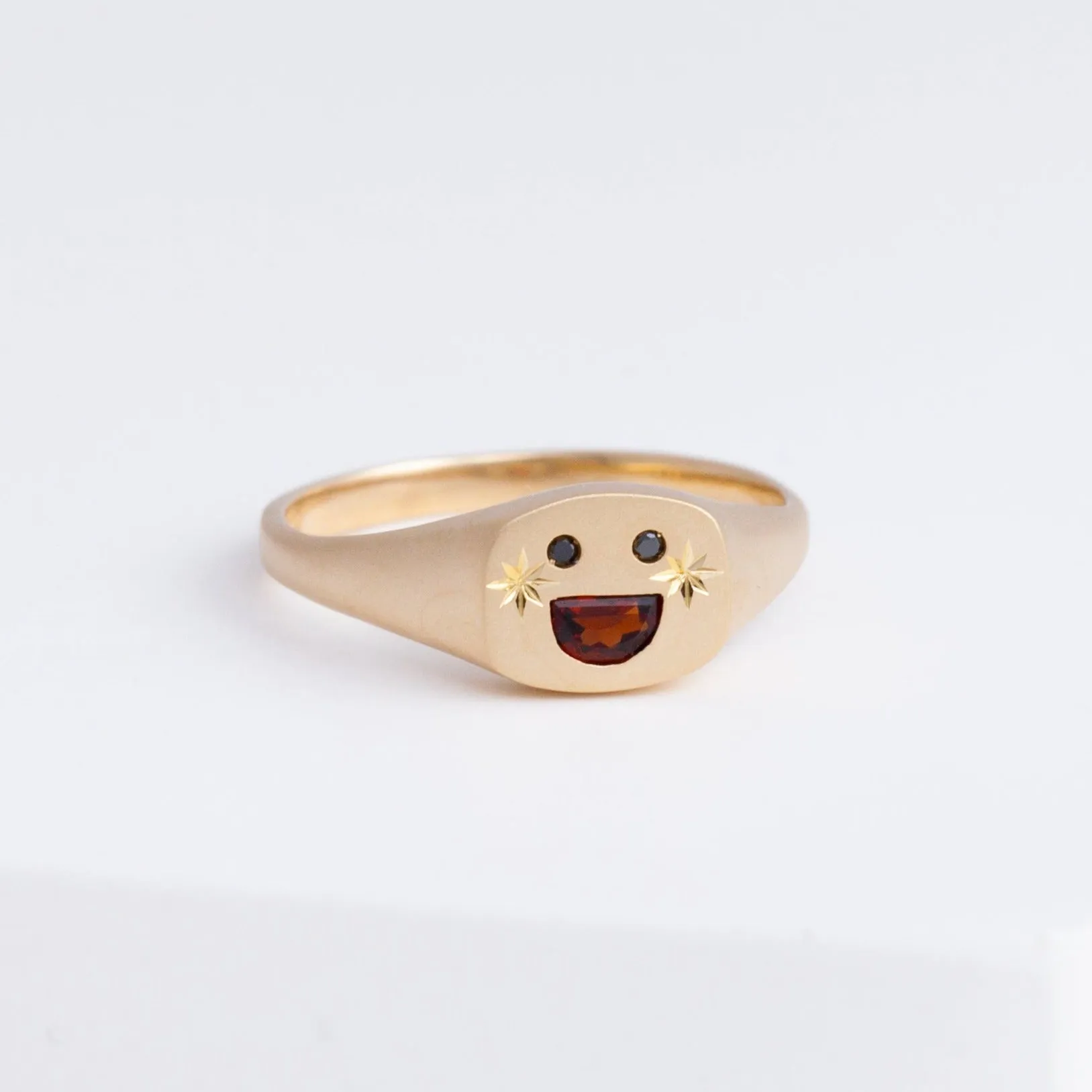 Small happy face signet ring with sparkly cheeks