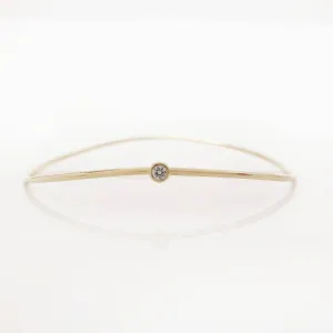 “Wave” Bangle with diamond in solid gold